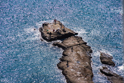 High angle view of rock formation on beach