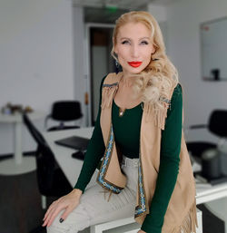 Portrait of beautiful businesswoman sitting at office