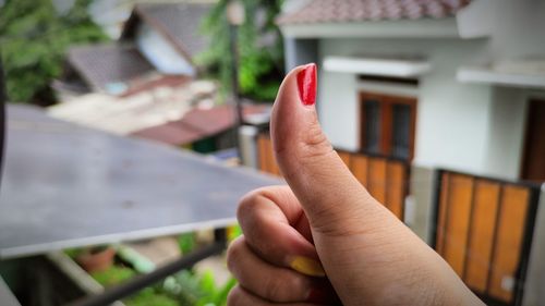 Close-up of person holding hand