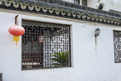 Low angle view of lantern on building