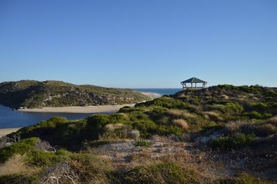 Scenic view of landscape against clear blue sky