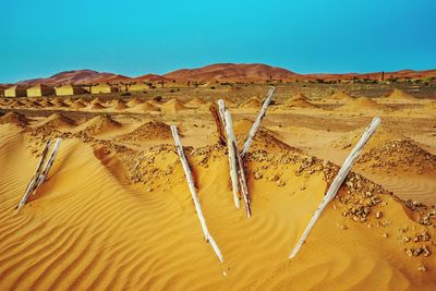 Scenic view of desert against clear sky