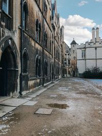 Surface level of old buildings against sky in city