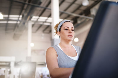 Woman exercising at gym