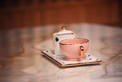 Coffee cup on table