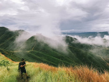 Scenic view of land against sky