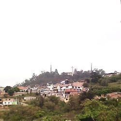 Buildings against clear sky