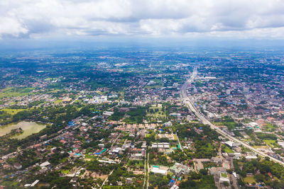 High angle view of buildings in city against sky