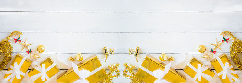 Low angle view of decoration hanging against wall