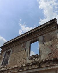 Low angle view of old building against sky