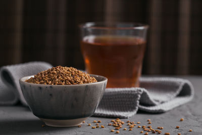 Egyptian fenugreek yellow tea or methi dana drink and fenugreek seeds