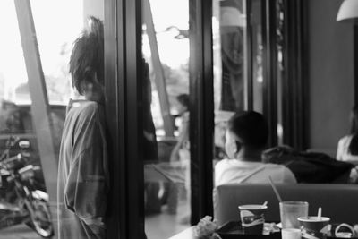 Woman sitting in restaurant