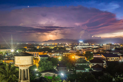 High angle view of illuminated buildings at night