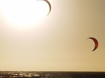 Scenic view of sea against clear sky during sunset