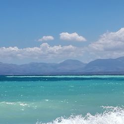 Scenic view of sea against blue sky