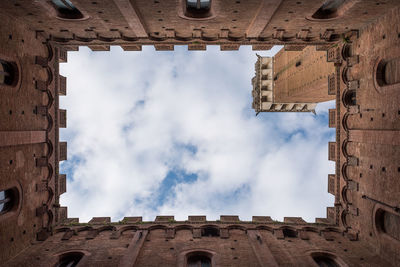 Low angle view of old building against sky