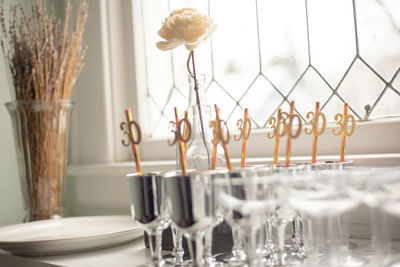 Close-up of glass vase on table