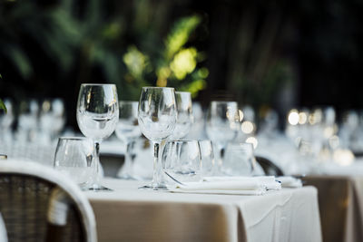 Close-up of wineglasses on table