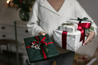 Woman holding christmas presents