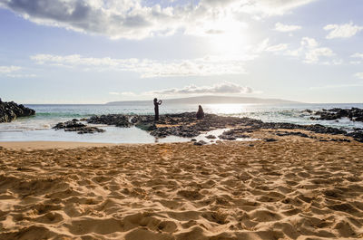 Scenic view of beach against sky