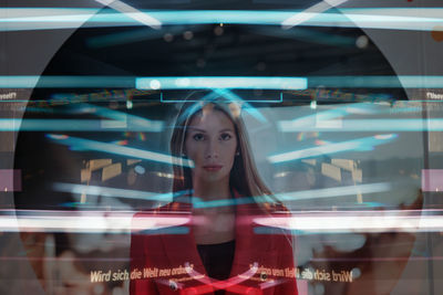 Tigerraw - young woman looking through window gallery view in the future cyber space