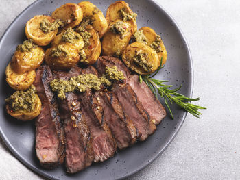 High angle view of meat in plate on table