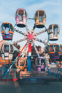 Low angle view of ferris wheel against sky