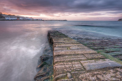 Scenic view of sea against sky during sunset