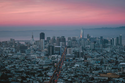 High angle view of cityscape against sky during sunset