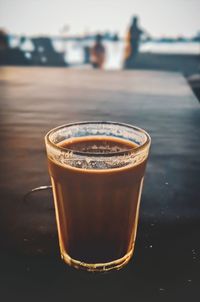 Close-up of coffee cup on table