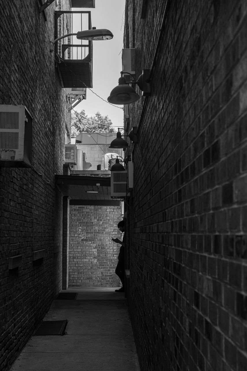 NARROW ALLEY BETWEEN BUILDINGS