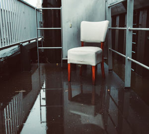 Empty chairs in abandoned building