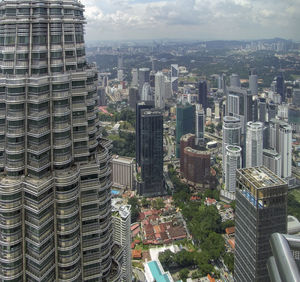 High angle view of buildings in city against sky