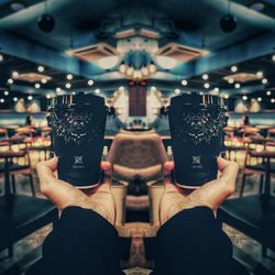 Close-up of hand holding drink