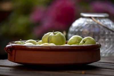 Close-up of fruits in bowl on table