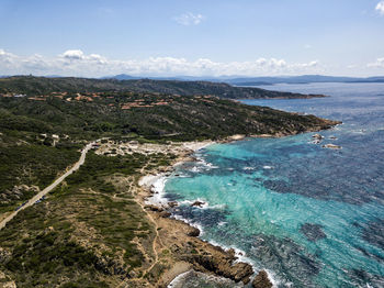 High angle view of bay against sky