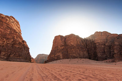 Desert road between mountains