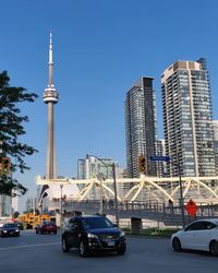 View of buildings in city against clear sky