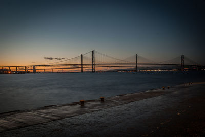 View of suspension bridge at night