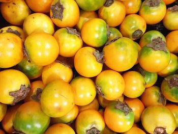 Full frame shot of oranges in market