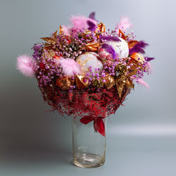 Close-up of pink flower vase on table