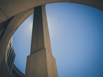 Low angle view of monument against blue sky