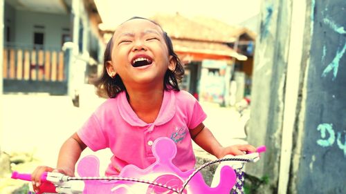 Portrait of cute girl looking away