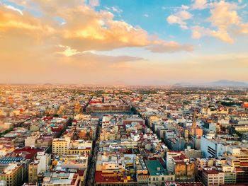 High angle view of townscape against sky during sunset