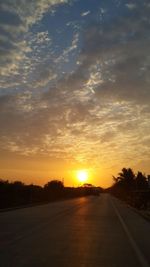 Road against sky during sunset