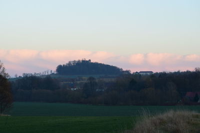 Scenic view of landscape against sky during sunset