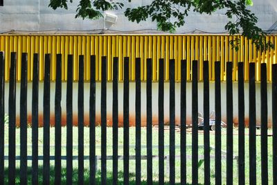 Close-up of yellow metal structure