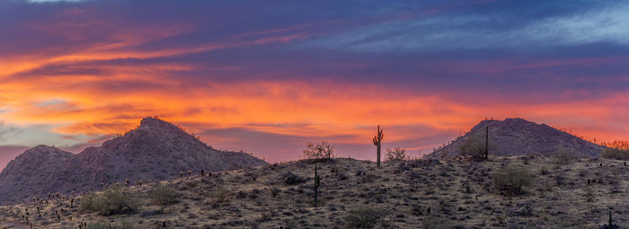 Scenic view of mountains against sky during sunset