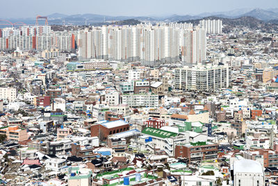 High angle view of modern buildings in city