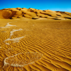 Sand dunes in desert